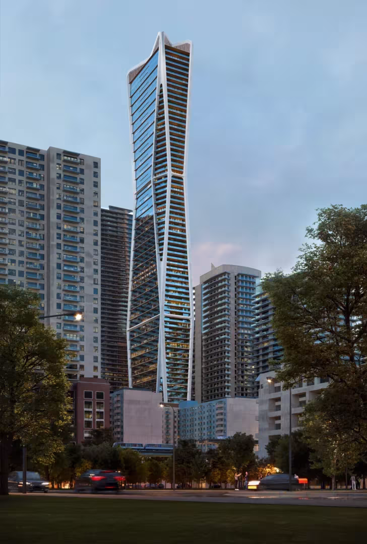 The curved white tower of 1040 S Miami Avenue among Miami's high rises
